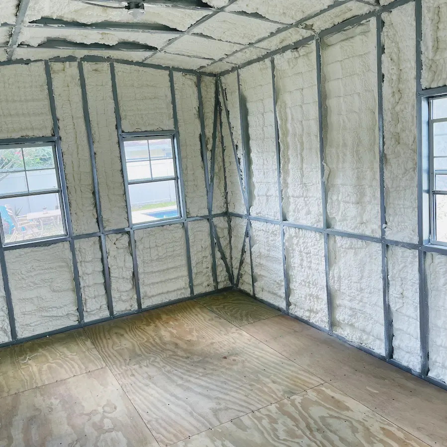 Closed-cell spray foam insulation applied to wall cavities in a residential project in Onalaska